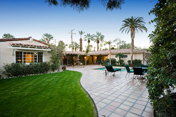 istock Patio With Pool In Front Of Modern House 467667232