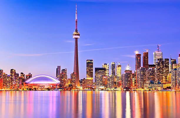 istock Impressive Toronto skyline reflected on water at sunset 467667826