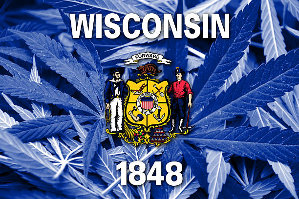istock Wisconsin State Flag on cannabis background. Drug policy. 467668294