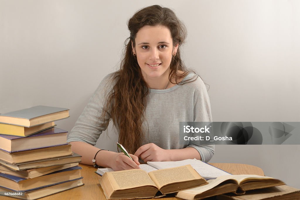 Eighteen-year old student is studying with pleasure Author Stock Photo