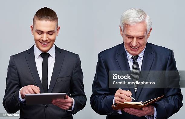 Different Business Habits Stock Photo - Download Image Now - Business, Generation Gap, Technology
