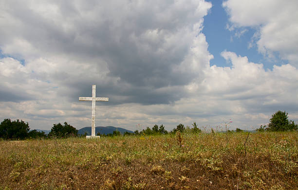 istock Old cross in the field. 467669259