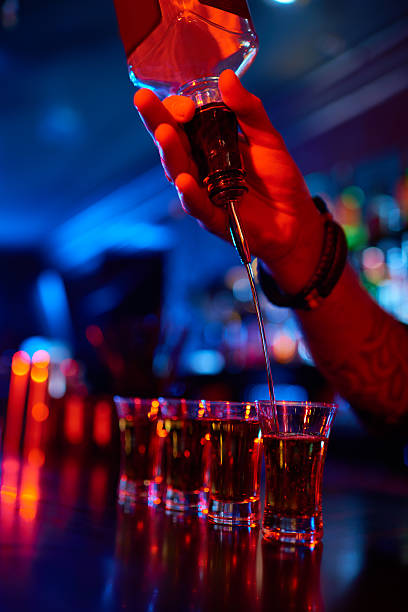istock Pouring hard liquor 467669310