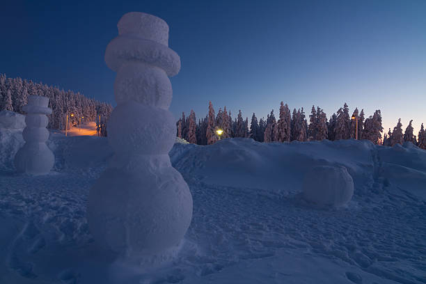 istock Giant snowman in winter wonderland 467673372