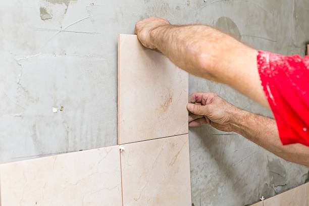 istock House renovation - tiles on wall 467674518