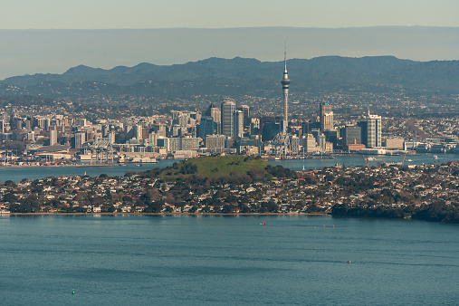 aerial view of Auckland and Devonport in New Zealand with Waitakere Ranges in background