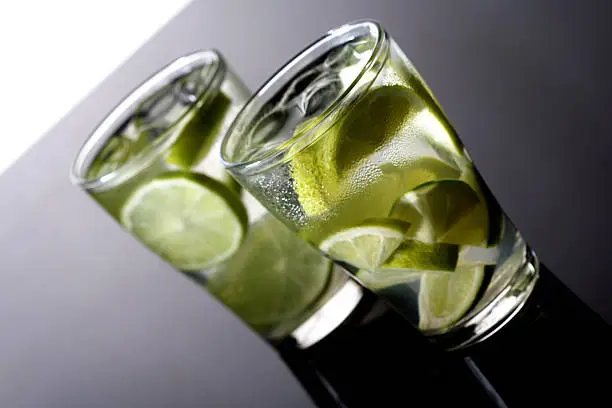 Photo of Close up of beverage with lime
