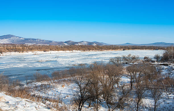 река в winter - winter stream river snowing стоковые фото и изображения