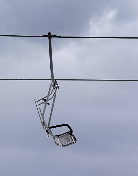 istock Chair-lift and gray sky 467680196