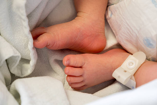 istock Baby feet close-up 467686980