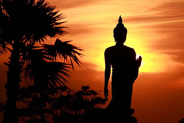 istock Silhouette of buddha statue 467690780