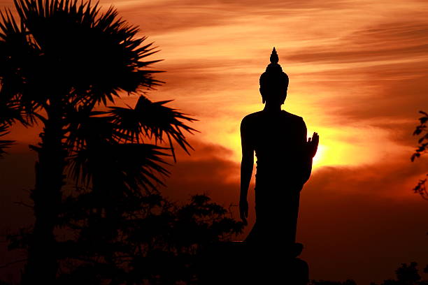istock Silhouette of buddha statue 467690784