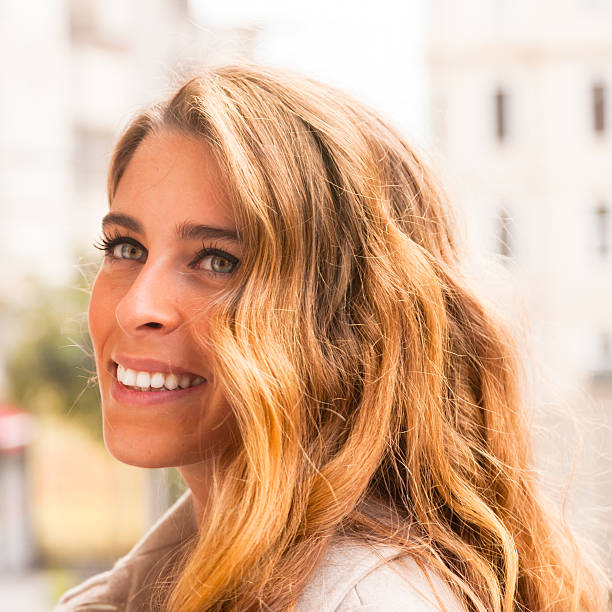 istock Young blond haired woman smiling 467691172