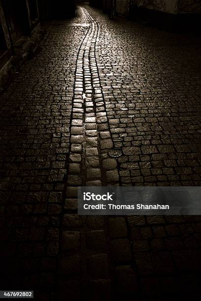 Cobble Stone Street At Night Stock Photo - Download Image Now - Black And White, Dark, Street