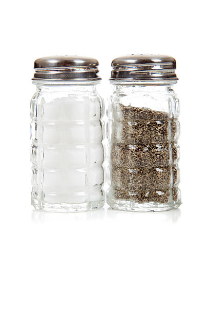 istock Crystal salt and pepper shakers on a white background 467693860