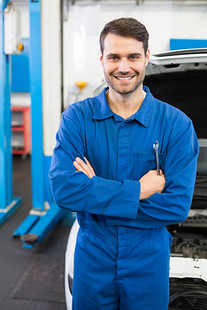 istock Mechanic smiling at the camera 467694160