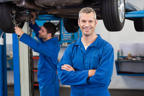 istock Team of mechanics working together 467698942