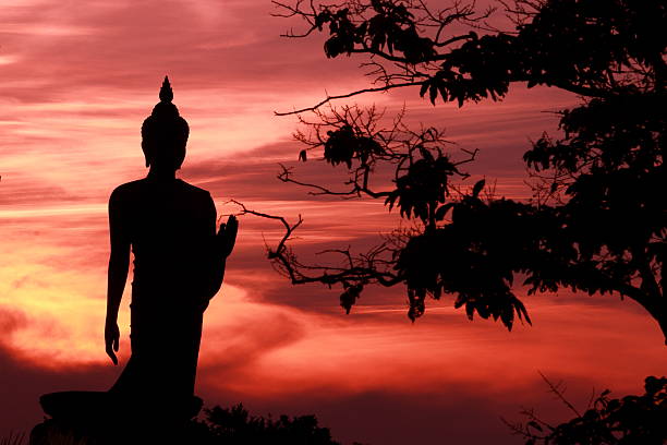 istock Silhouette of buddha statue 467699442