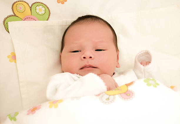 istock baby in the crib 467703316
