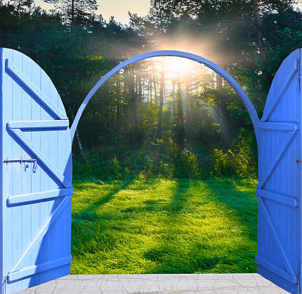 istock open door and a winter forest 467703720
