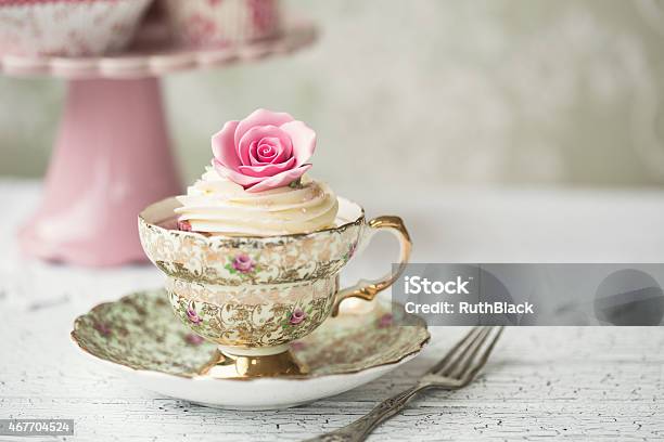 Cupcake In A Vintage Teacup Stock Photo - Download Image Now - Tea Party, Afternoon Tea, Old-fashioned