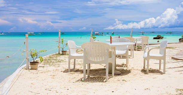 istock Outdoor white cafe on tropical beach 467705692