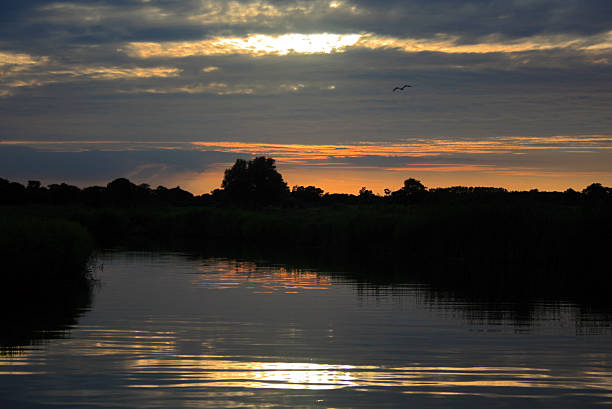 Norfolk Broads Sunset Reflection stock photo
