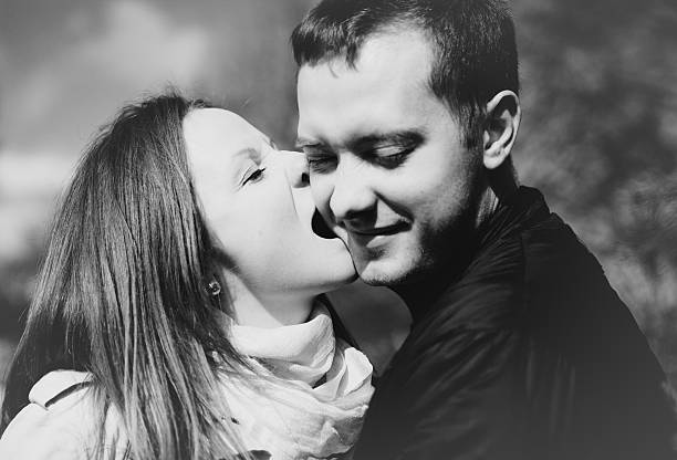 istock Young happy couple being silly B&W 467706514