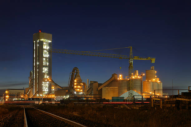 Concrete Plant Dawn A concrete plant in the early morning twilight. cement factory stock pictures, royalty-free photos & images
