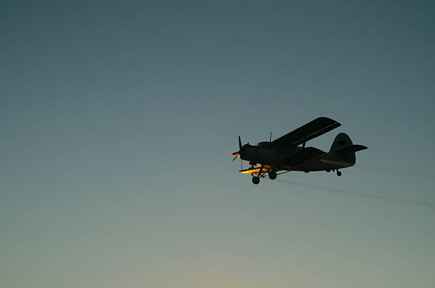istock Spraying mosquitoes with the plane 467708736