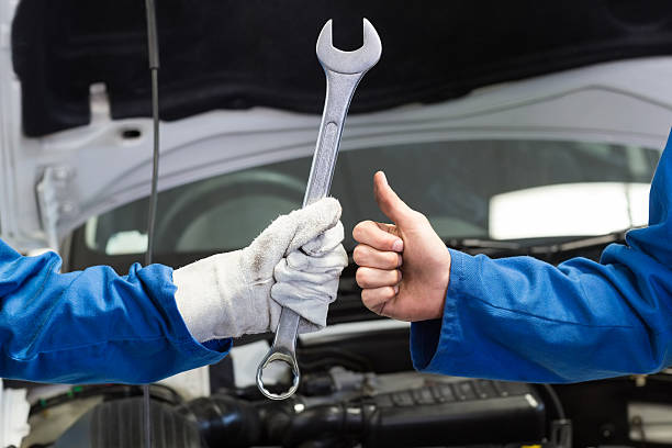 istock Team of mechanics working together 467709434