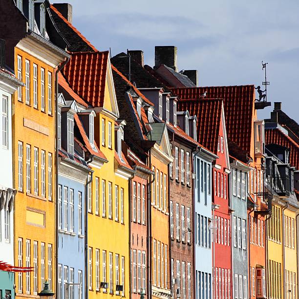 Copenhagen, Denmark - colorful buildings of Nyhavn street. Oresund region. Square composition.