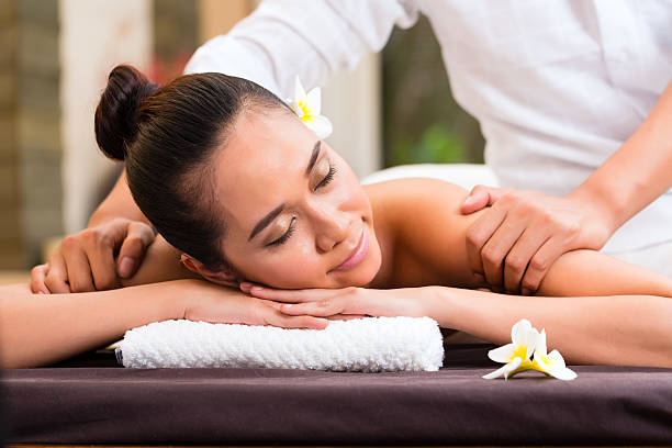 istock Indonesian woman wellness massage in spa 467710841
