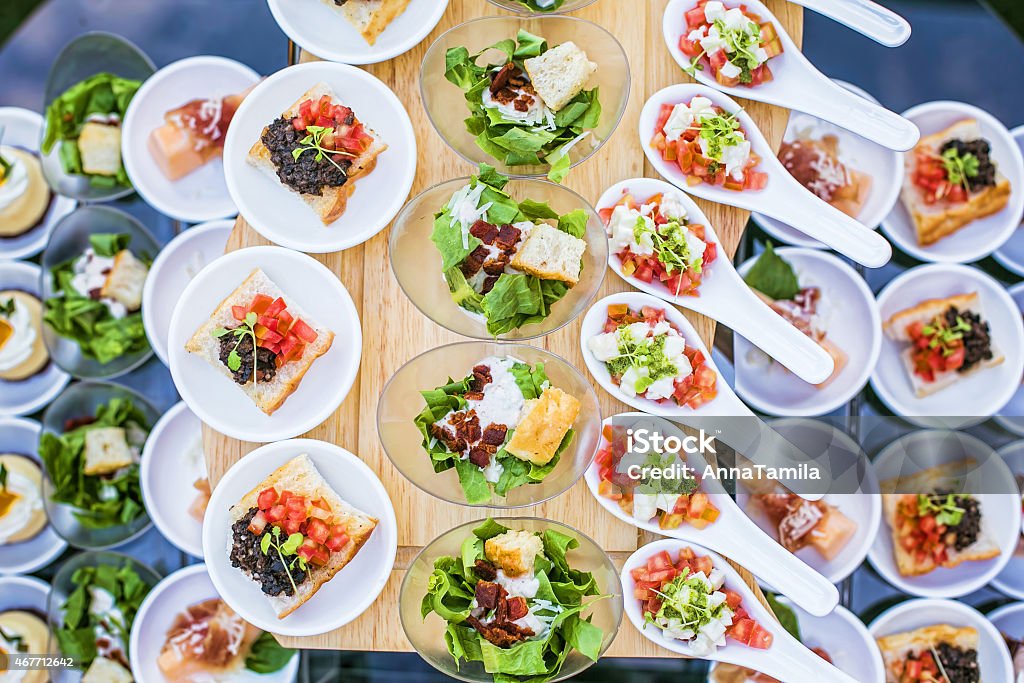 A Wedding Table Filled with Luxury Food Luxury food and drinks on wedding table Food Stock Photo