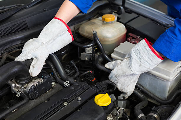 istock Mechanic working under the hood 467712882