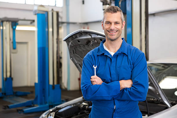 istock Mechanic smiling at the camera 467713220