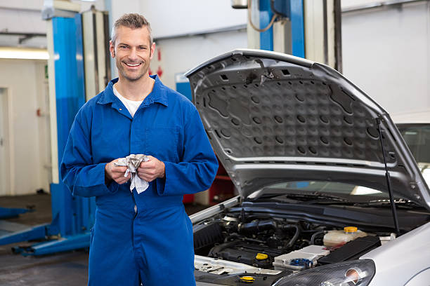 istock Smiling mechanic looking at camera 467713252