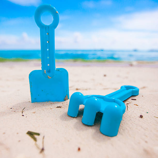 istock Summer kid's beach toys in the white sandy beach 467713432