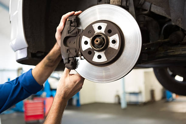 istock Focused mechanic adjusting the wheel 467713514