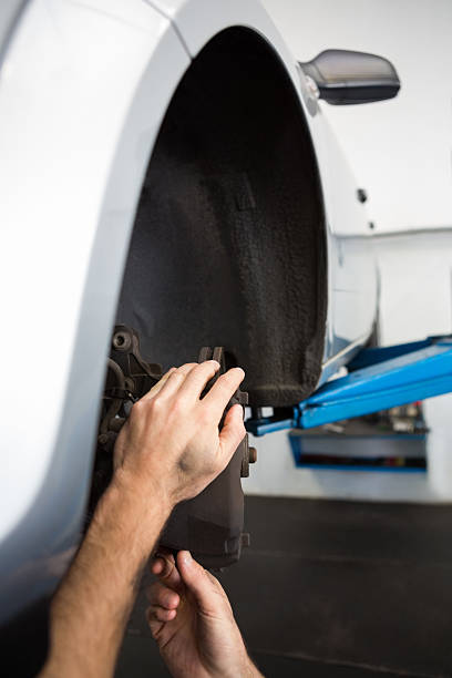 istock Focused mechanic adjusting the wheel 467713520