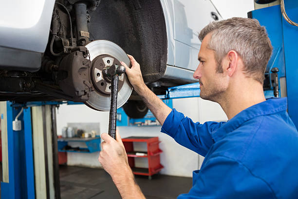 istock Focused mechanic adjusting the wheel 467713600