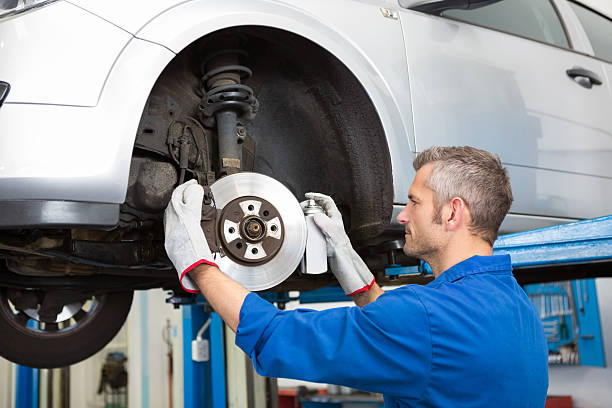 istock Focused mechanic adjusting the wheel 467713608