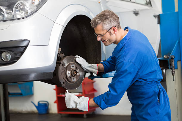 istock Focused mechanic adjusting the wheel 467713612