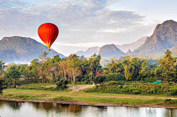 istock Hot air balloon at sunrise, Vang Vieng Laos 467713629