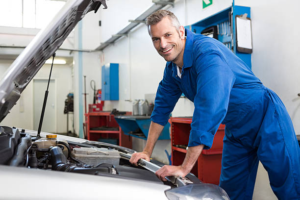 istock Mechanic working under the hood 467713788