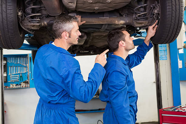 istock Team of mechanics working together 467713960