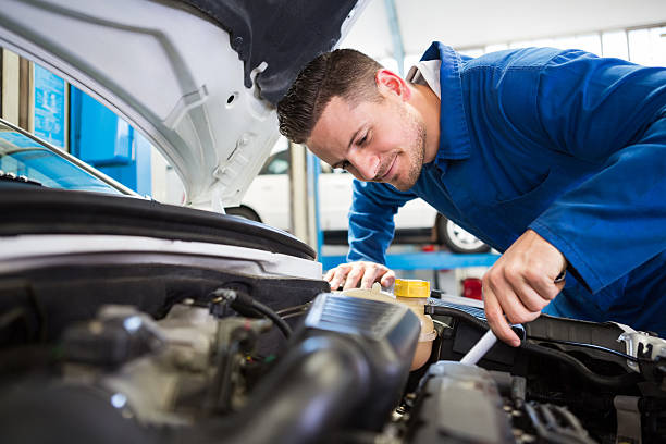 istock Mechanic working under the hood 467714060