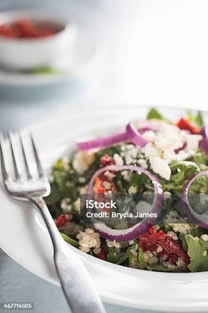 Arugula Quinoa Salad With Sun Dried Tomatoes Stock Photo - Download Image Now - Arugula, Cheese, Copy Space