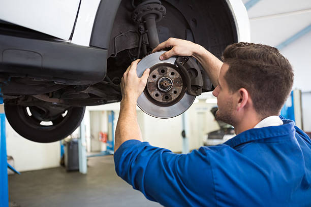istock Focused mechanic adjusting the wheel 467714856