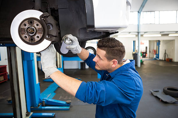 istock Focused mechanic adjusting the wheel 467714994